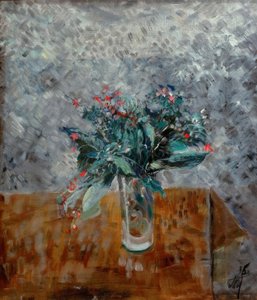 Fleurs dans un grand verre