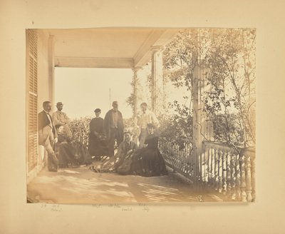 [Group portrait on porch] - Alfred Booth