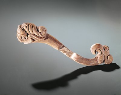 Pièce de joue décorée de têtes, nomade de l
