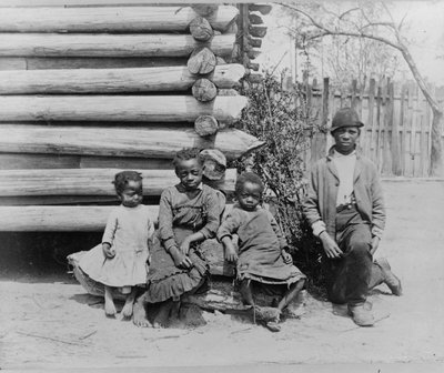 Homme afro-américain avec des enfants près de Thomasville, Géorgie - American Photographer
