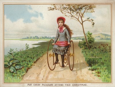 Fille roulant en tricycle à la campagne - American School