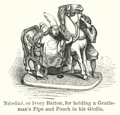Netsuke, ou bouton en ivoire, pour tenir la pipe et la pochette d