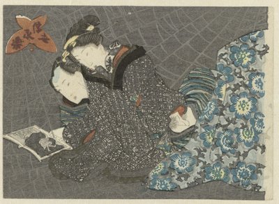Couple amoureux regardant un livre shunga - Anonymous