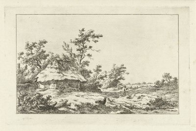 Homme avec un râteau près d
