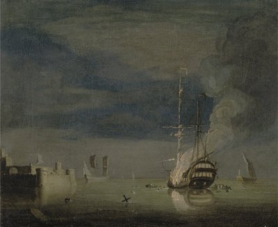 Un deux-ponts en feu la nuit au large d