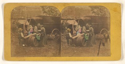 [Groupe familial devant un chariot, le père et l