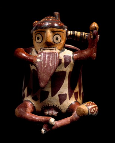 Vase anthropomorphe représentant un musicien jouant de la flûte de Pan. 100 av. J.-C.-800 apr. J.-C. Lima, Musée Archéologique - Culture Nazca