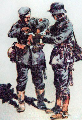 Un infirmier de premier secours soigne un officier blessé sur le front occidental - E. (after) Dobrich