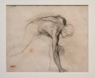 Homme nu se penchant pour ramasser un objet. Vers 1859-1861. Graphite sur papier vélin. - Edgar Degas