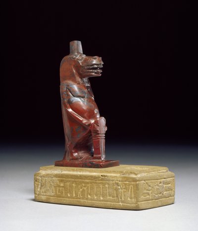 Déesse hippopotame Taueret, tenant une tresse de papyrus roulé formant le signe hiéroglyphique protecteur, 