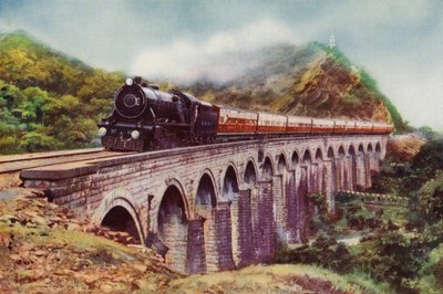 Locomotive à vapeur 4-6-2 du Chemin de fer Bombay, Baroda et Central India transportant le Frontier Mail passant sur un viaduc entre Bombay et Delhi - English School