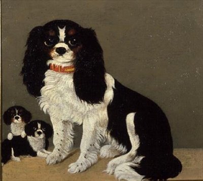 Un épagneul Cavalier King Charles avec des chiots - English School