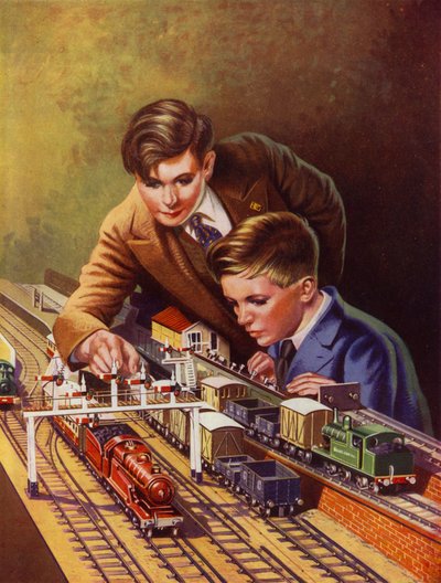 Garçons jouant avec un train miniature - English School