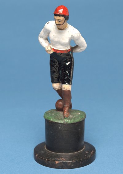 Footballeur avec le ballon à ses pieds - English School