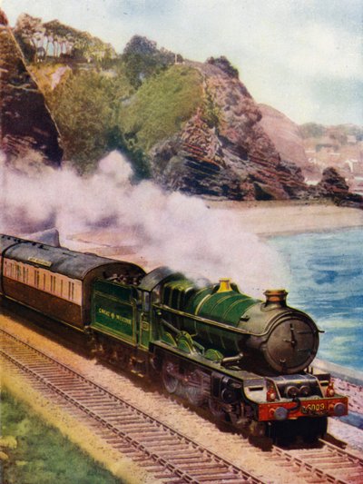 King Charles II, locomotive à vapeur King class 4-6-0 du Great Western Railway (GWR), transportant le Cornish Riviera express le long de la côte entre Dawlish et Teignmouth, Devon - English School
