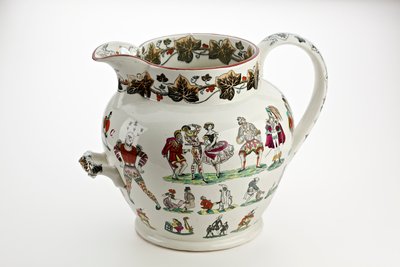 Cruche Staffordshire décorée de figures d