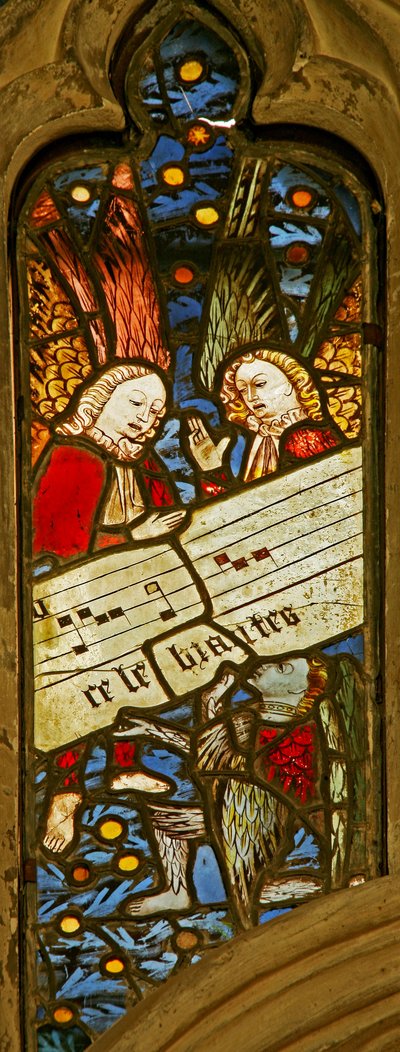 Fenêtre n2 représentant la chorale angélique avec une partition musicale - English School