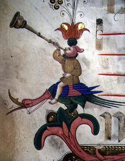 Missel 515 f.9r Figure soufflant dans une corne, montée sur un oiseau harnaché, détail de la bordure décorative d