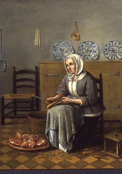 Une femme assise préparant de la nourriture dans une cuisine - Franciscus Carree