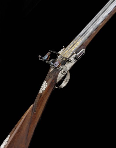 Un fusil de chasse français à silex à double canon de 20 calibres, monté en argent, c.1725 - French School