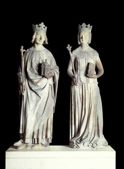 Art France : Statues du roi de France Charles V dit Charles le Sage (1338-1380) et de la reine de France Jeanne de Bourbon (1337-1378). Sculpture en calcaire du XIVe siècle. Probablement de la façade de l