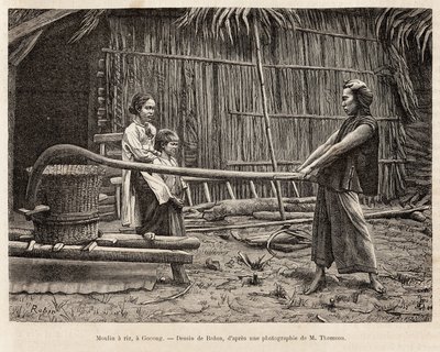 Le moulin à riz, devant la maison d