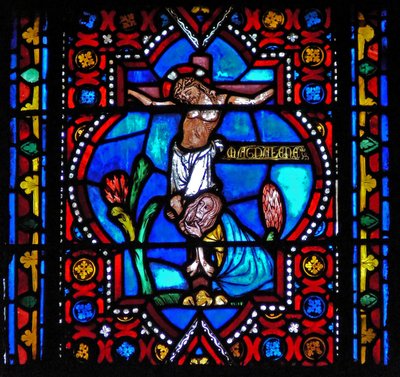 Fenêtre n1-L représentant une scène de la vie de Sainte Marie-Madeleine - la sainte au pied de la Croix - French School