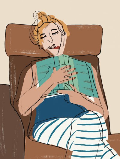 Une femme en train de lire, dans une ambiance chaleureuse - GIovanna Gil Alves