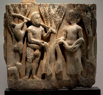 Échange de vêtements avec un chasseur. Bas-relief sculpté, art du Gandhara (Pakistan), 2e-3e siècle. Musée national de Corée, Séoul (Corée du Sud). - Gandhara School