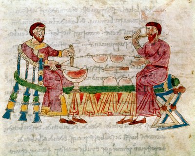 Deux hommes à table pendant un repas tiré du volume « De Mensis et Escis », manuscrit « De Universo » (ou De rerum naturis (De la Nature des choses)) (cod. 132) par Rabanus Maurus Magnentius (ou Raban Maur ou Rabano Mauro) (ca. 780-856). 9ème siècle. Archi - German School