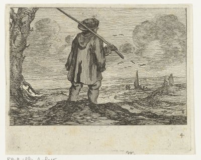 Paysage de dunes avec un homme, avec un bâton sur l