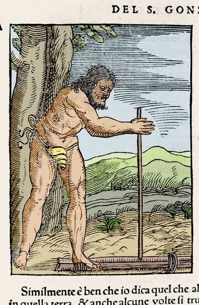 Un homme indigène allumant un feu en frottant deux morceaux de bois. Gravure de « Navigationi et Viaggi » par Giovanni Battista Ramusio (1485-1557), vol. III, Venise 1565. - Italian School