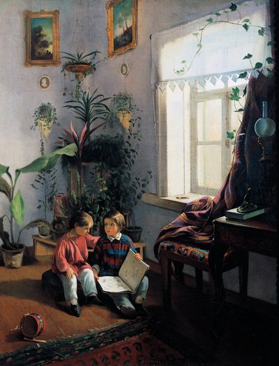 Enfants feuilletant un livre d