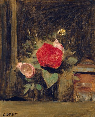 Bouquet de fleurs dans un verre à côté d