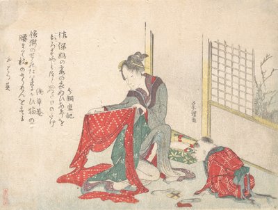 Femme pliant du tissu - Katsushika Hokusai