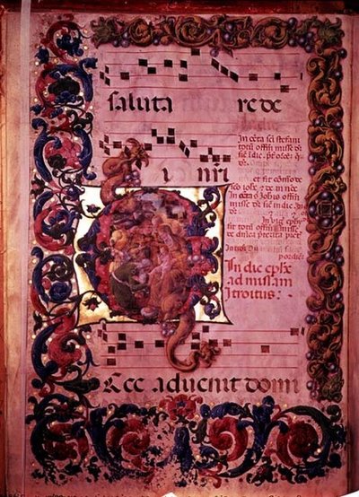 Page de musique avec une initiale historiée G représentant l