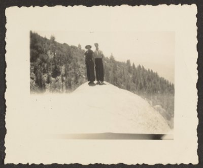 [Figures Standing on Rock] - Louis Fleckenstein