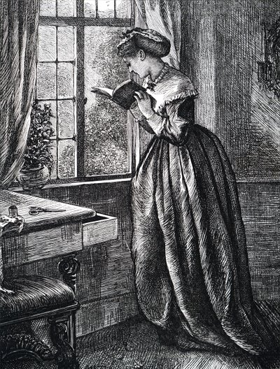 Une jeune femme lisant près d