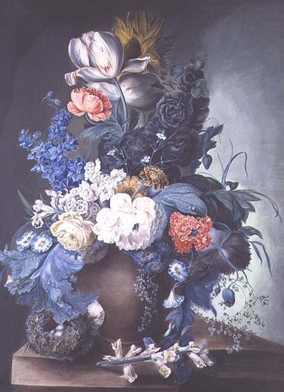 Groupe de fleurs dans un pot et nid d