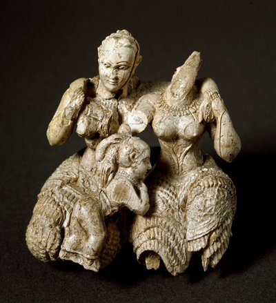 Art mycénien : idole en ivoire composée de deux divinités et d