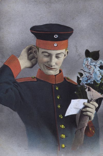Soldat allemand tenant une note et un bouquet de fleurs - Photographer German
