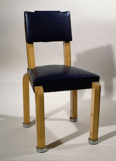 Chaise, par Pierre-Emile Legrain, en cuir bleu et bois de sycomore, style Art déco - Pierre E. Legrain