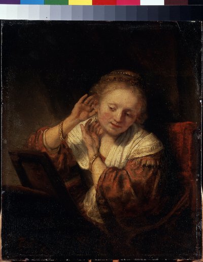 Jeune femme essayant des boucles d