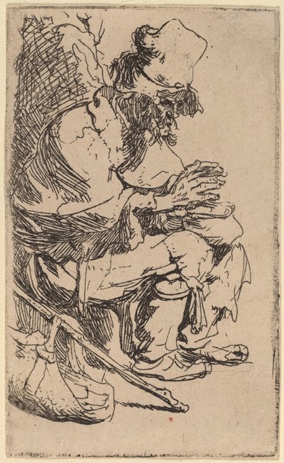 Mendiant assis réchauffant ses mains à un brasero - Rembrandt van Rijn
