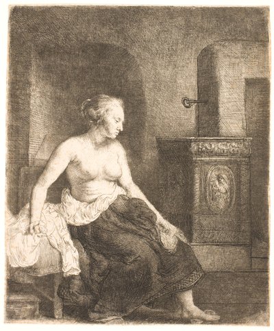 Femme assise à moitié habillée près d