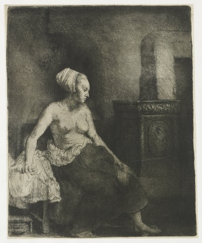 Femme assise à moitié habillée près d