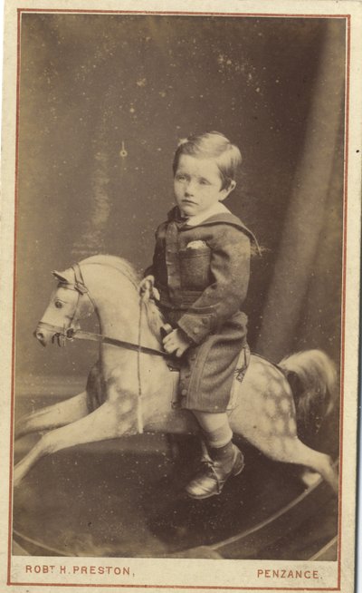 Jeune garçon assis sur un cheval à bascule, 1870s - Robert H. Preston