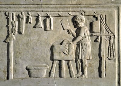 Un boucher dans son échoppe. Bas-relief, civilisation romaine, 2e siècle ap. J.-C., Rome, Museo della Civilta Romana - Roman