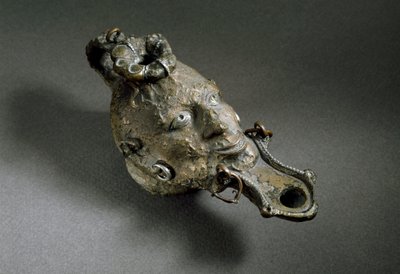 Art romain : lampe à huile en bronze en forme de visage - Roman