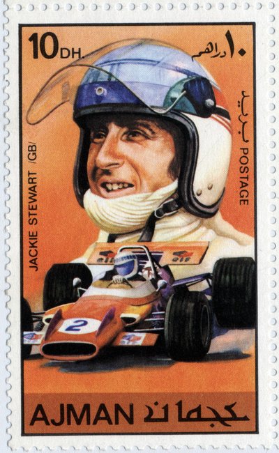 Timbre des Émirats représentant le pilote de voiture écossais Jackie Stewart (né en 1939) - School Arabic